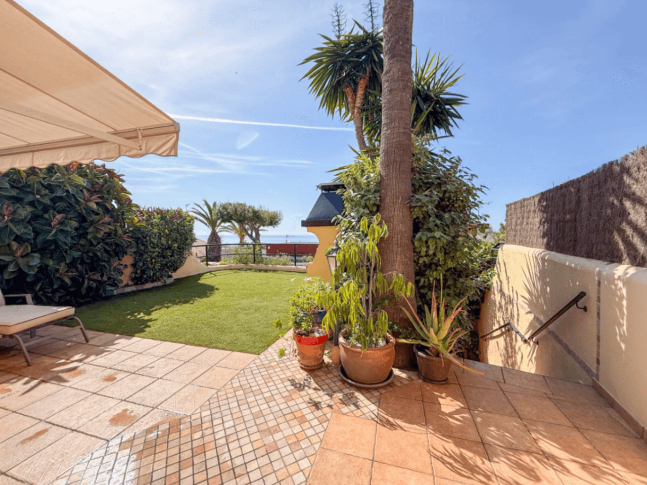 Sea-view townhouse with private garden in gated Vallpineda community, Sitges