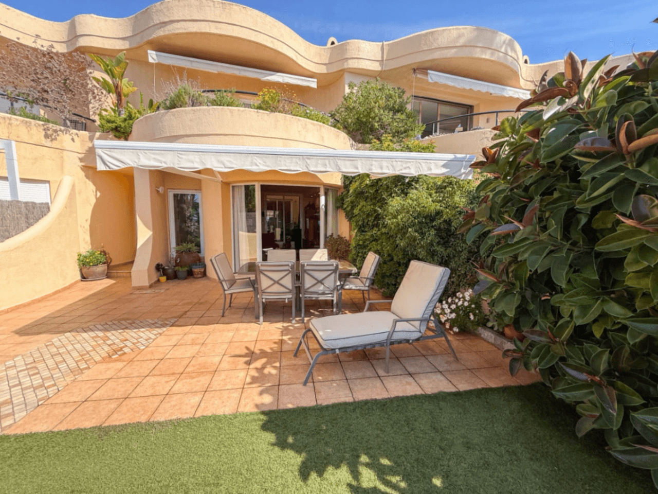 Sea-view townhouse with private garden in gated Vallpineda community, Sitges