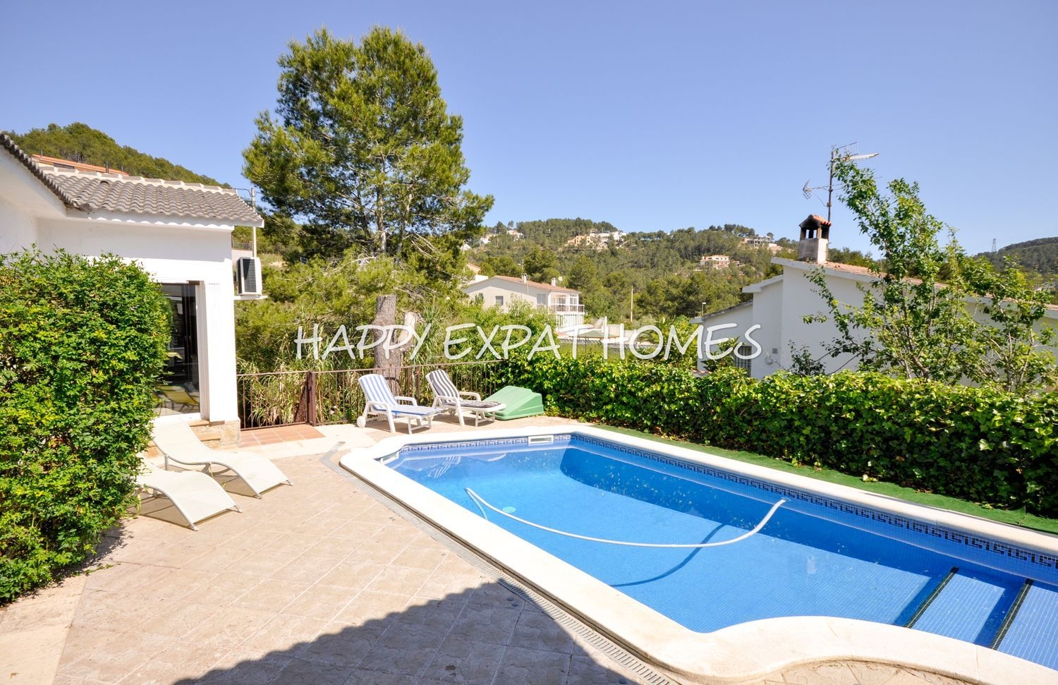 Bungalow style villa surrounded by the green hills of Garraf